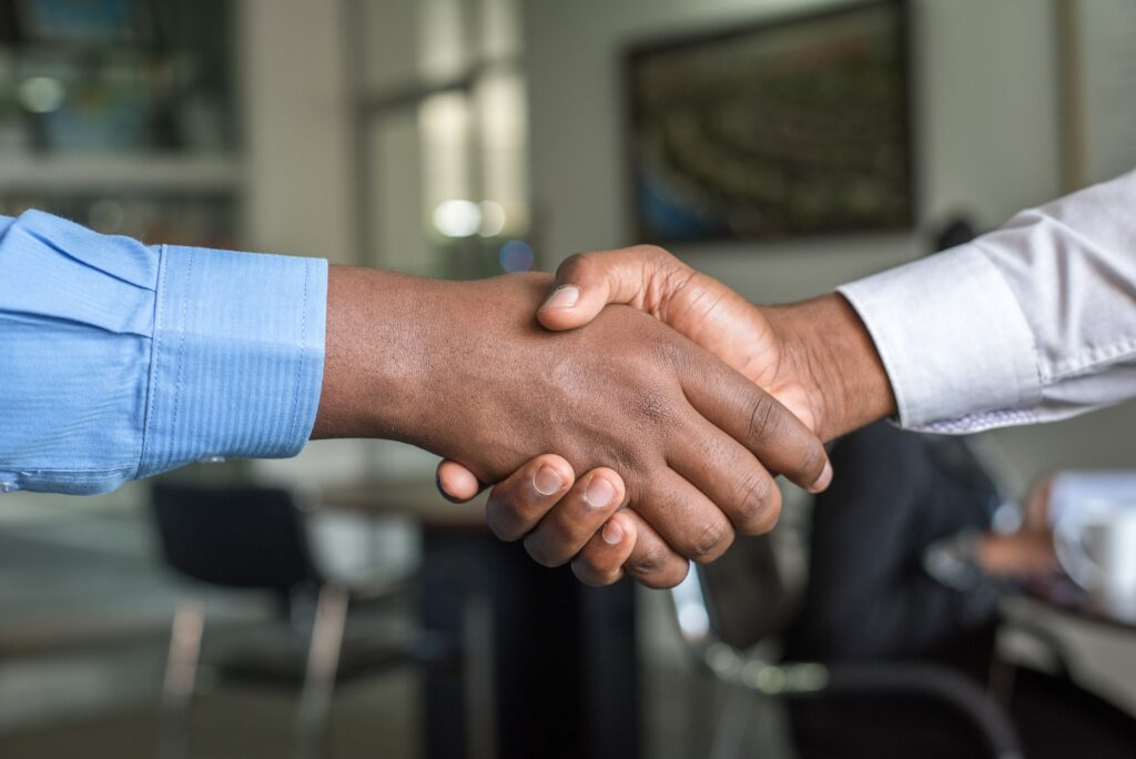 Image showing two people shaking hands.