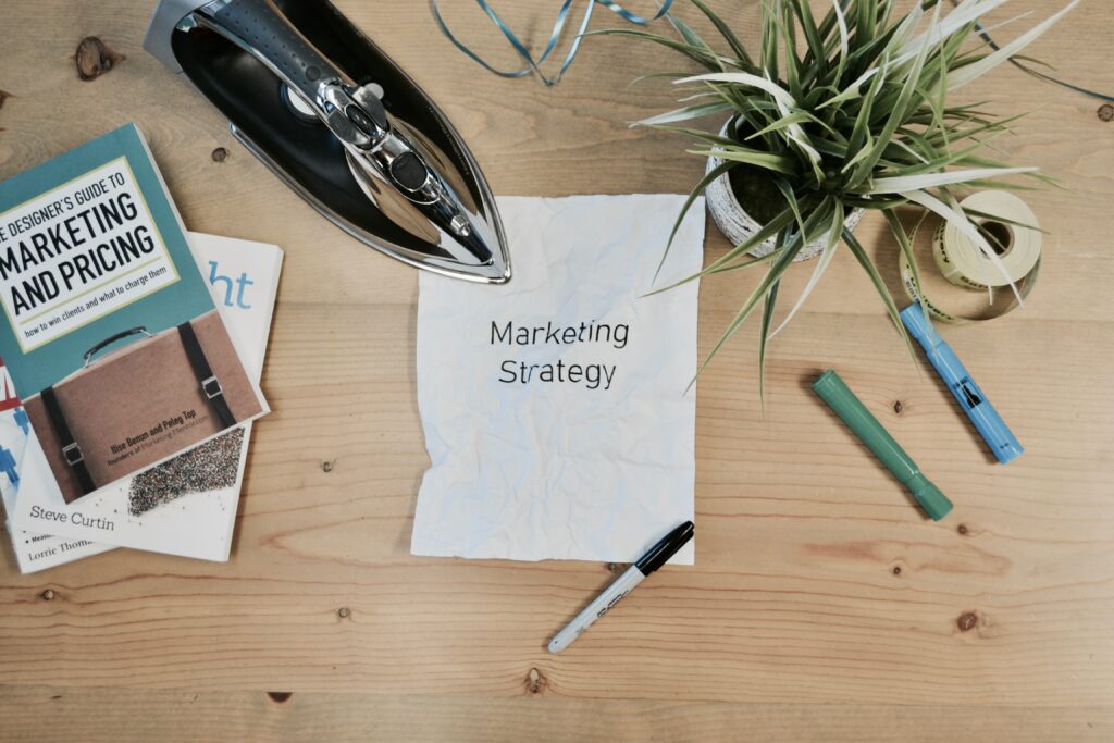 Image showing a piece of paper titled "Marketing Strategy"